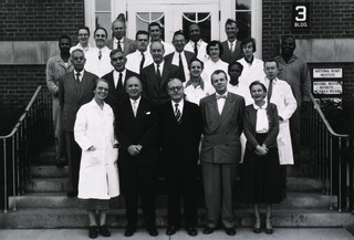 [Dr. Evelyn Anderson and members of the Endocrinology Section on the steps to Building 3]
