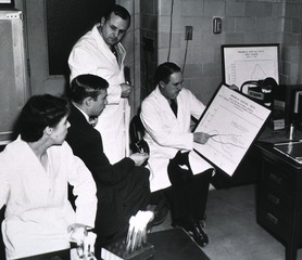 [Dr. Evelyn Anderson and others in a laboratory]