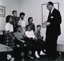 [Dr. Jack Masur meets with a group of local elementary school children]