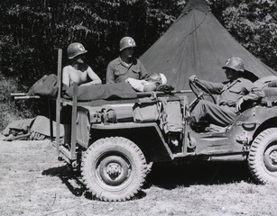 [Transportation of wounded by jeep]