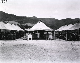 [Exterior view of utility and office tents]