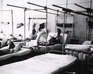 Patients in the orthopedic ward of the 5th Field Hosptal, Santo Tomas University, Manila Luzon, P.I