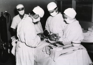 [Surgical procedure at the 54th General Hospital, Base "G", Hollandia, Dutch New Guinea]