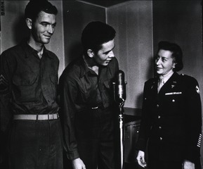 [Army Nurse Capt. Alice Thomas with Sgt. Don White and Sgt. Bob DeLaney]