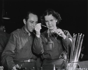 [Army Nurse Lt. Margaret M. Strong, at work in laboratory]