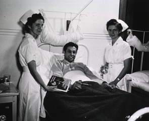 [Army Nurses, (twins) Katherine and Rebecca Schmidt with patient]