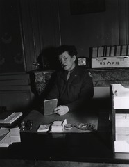 [Army Nurse Capt. Mable V. Gardner sitting at her desk]