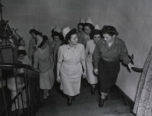 [Army Nurses on a spiral stairway]