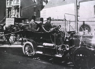 [Rupert Blue and William C. Rucker in a chauffer-driven car, San Francisco, Calif.]