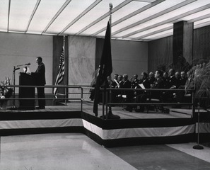 [Dr. Daniels at podium on the platform for the dedication ceremony]