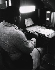 Mr. Parkam using microfilm camera