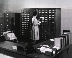 [Florence Smith at the card catalog]