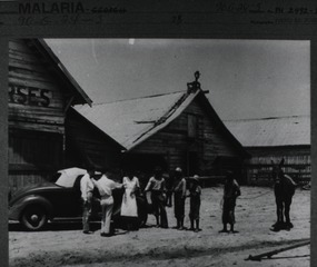 [PHS workers distribute atabrine to FSA family during malaria prophylaxis studies in Jenkins County, Georgia]