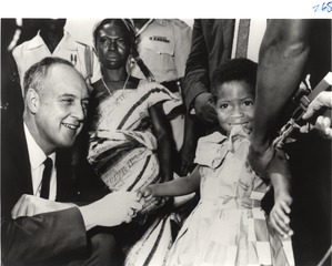 [Surgeon General William Stewart with Rebecca Ansah Asamoah, recipient of the 25-millionth smallpox vaccination]
