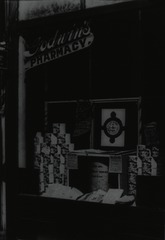[Toilet paper display in window of Godwin's Pharmacy, Mitchell, Indiana]