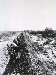 [Laying pipe for village water system]
