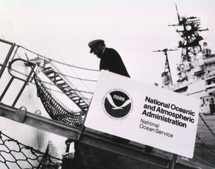 Surgeon General C. Everett Koop walking up the gangplank of a NOAA vessel, 1985