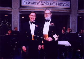 [Surgeon General C. Everett Koop stands with the conductor of the Coast Guard band]