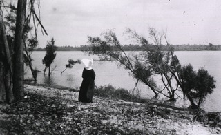 [A Sister of Charity looking out over the Mississippi River]