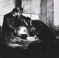 M. and Mme. Curie Experimenting with Radium