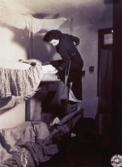 Nurse climbing into the upper bunk