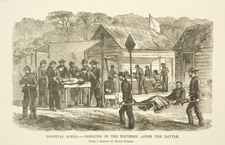 Hospital scene, bringing in the wounded after battle