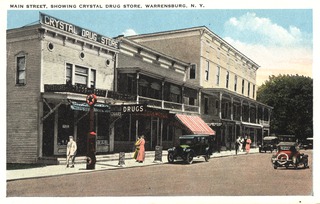 Main Street, showing Crystal Drug Store, Warrensburg, N.Y