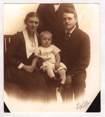 Christian B. Anfinsen sitting on parents' lap at age 1