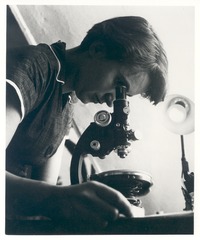Rosalind Franklin with microscope