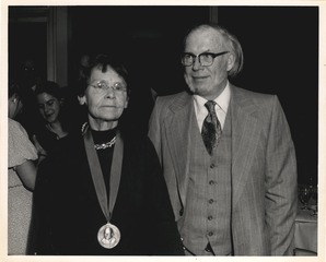 Barbara McClintock with an unidentified man at the Rosenstiel Awards