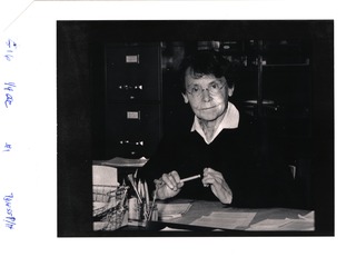 Polaroid test photograph of McClintock at her desk