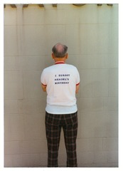 Victor McKusick wearing a Bar Harbor course T-shirt (back)