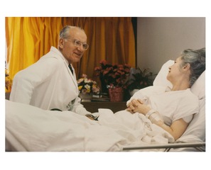 Victor McKusick visiting patient in hospital