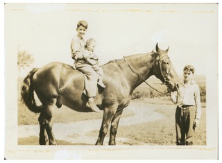 Victor McKusick, age 14, on horse