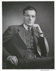 Portrait of Victor McKusick (seated with chin on hand)