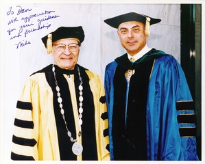 Daniel Nathans with Michael M. E. Johns in academic regalia