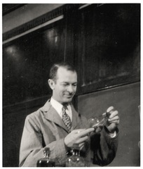 Linus Pauling holding a chemical model