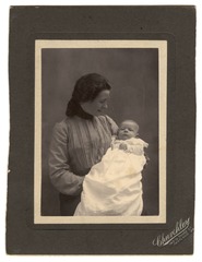 Belle Pauling holding baby Linus