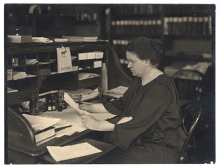 Florence Sabin working at her desk at Johns Hopkins University