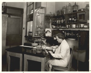 Sabin sitting in her lab at the Rockefeller Institute