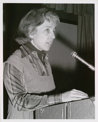 Maxine Singer speaking at lectern
