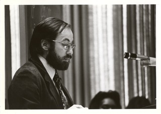 David Baltimore speaking at the February 1976 NIH Director's Advisory Committee Meeting on Recombinant DNA