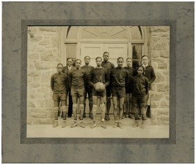 Coach Charles Drew with the Morgan College basketball team