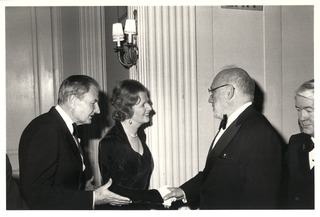 Joshua Lederberg being introduced to British Prime Minister Margaret Thatcher by David Rockefeller