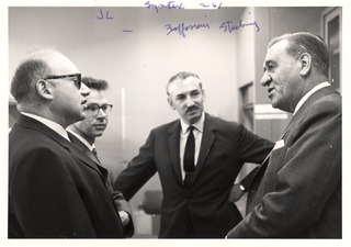 Joshua Lederberg with Alex Zaffaroni and J. E. Wallace Sterling at the Syntex Institute for Molecular Biology