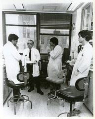 Sol Spiegelman with research associates