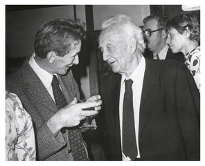 Andrew and Albert Szent-Gyorgyi talking at a party