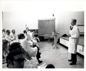 Clarence Dennis lecturing at North Shore Hospital, Cornell University Medical College