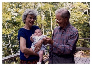 Clarence Dennis with his wife, Mary, and grand-daughter, Emily