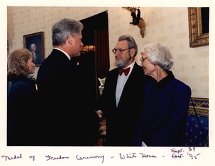 C. Everett Koop receiving the National Medal of Freedom from President Bill Clinton and First Lady Hillary Clinton
